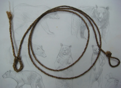 Making a primitive sinew bow string with reverse twist cordage